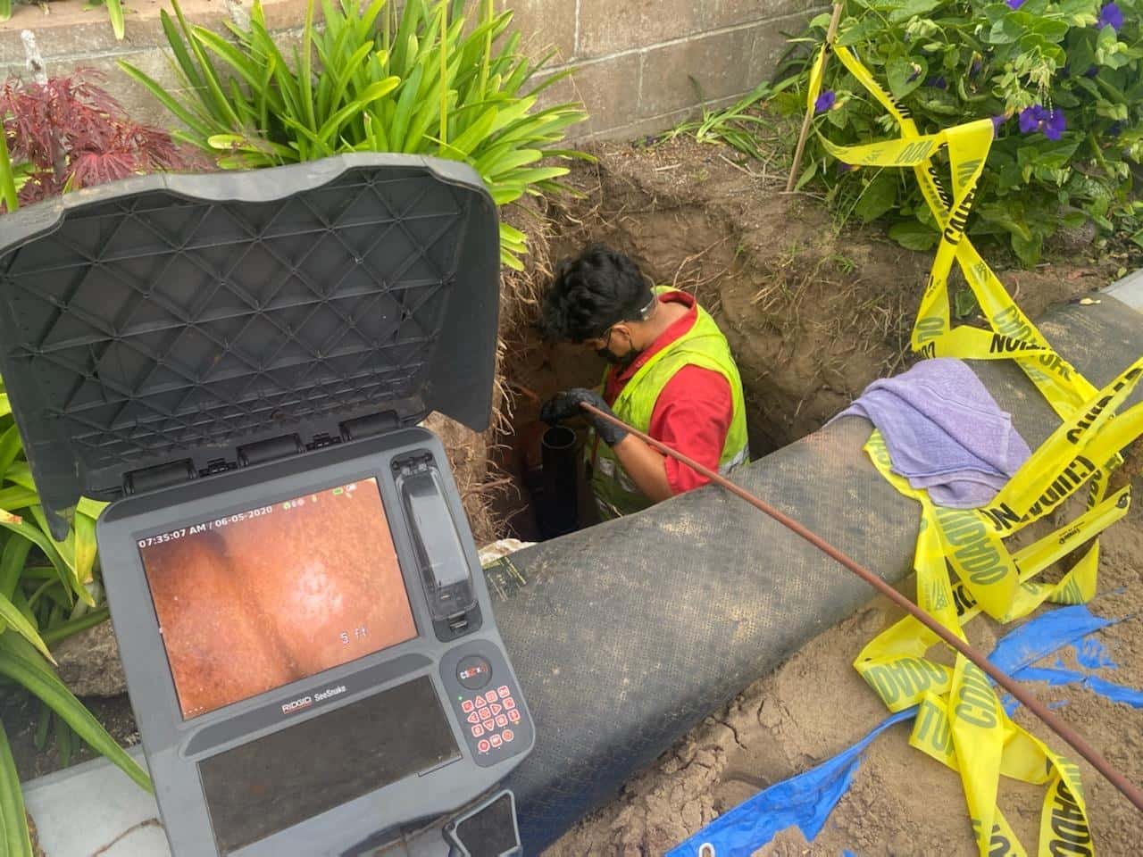 Cleaning and removing roots in 60ft of clay pipe with a 4″-6″ transition